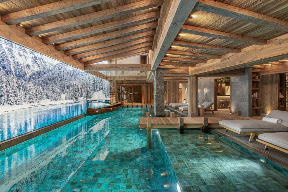 Courchevel 10 indoor infinity pool with turquoise mosaic tiles and alpine mural, Courchevel 1850, France