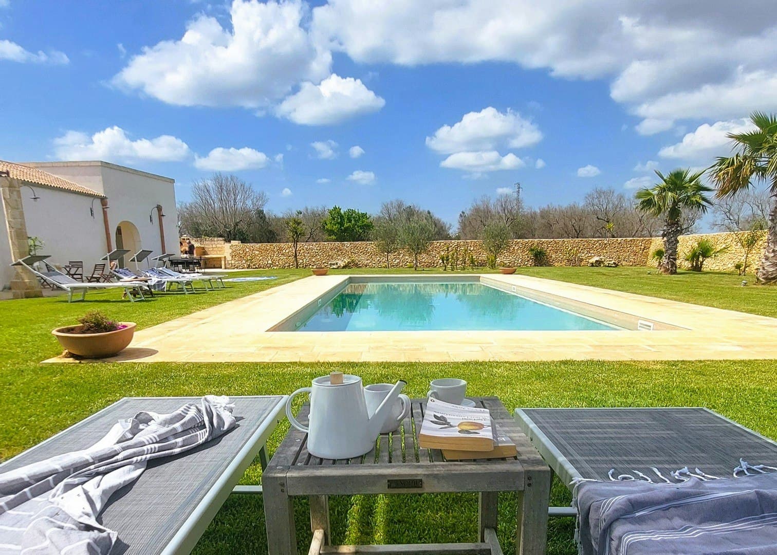 Puglian Farmhouse rectangular pool with traditional stone architecture, Lecce, Puglia, Italy