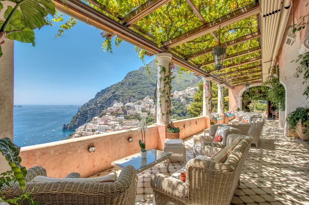 Villa San Giacomo covered loggia terrace with sea views over Positano, Amalfi Coast, Italy