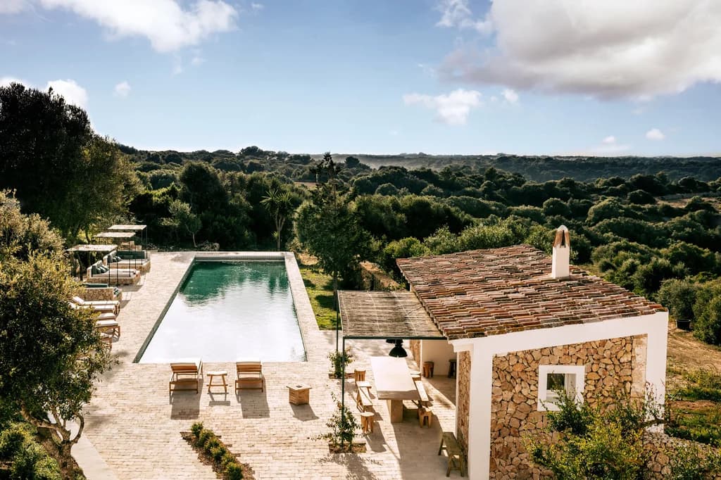 Montana del Aguila villa exterior with lap pool and stone pavilion, Menorca, Spain