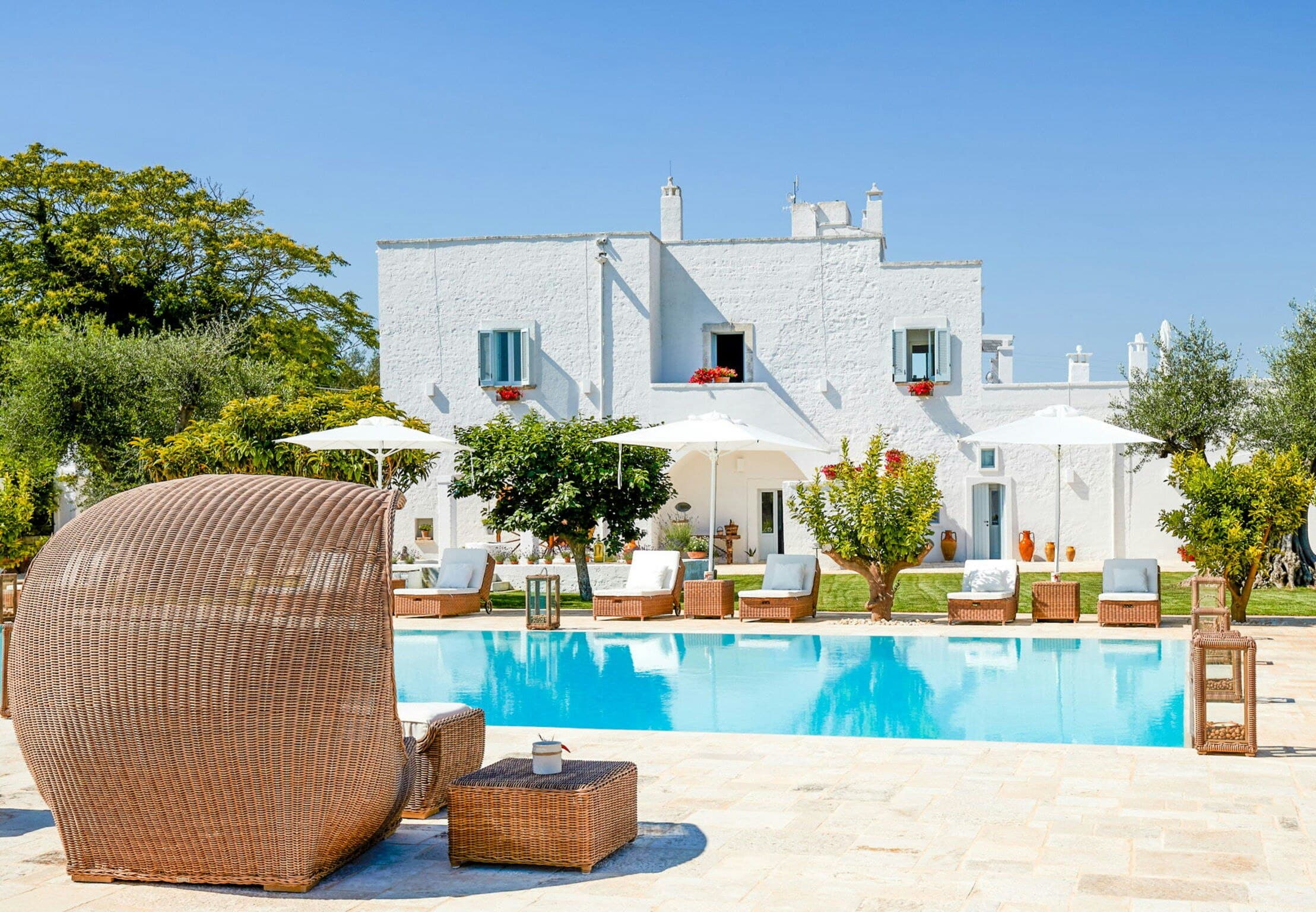 Mediterranean Sunhouse villa exterior with pool and traditional Puglian architecture, Polignano a Mare, Italy