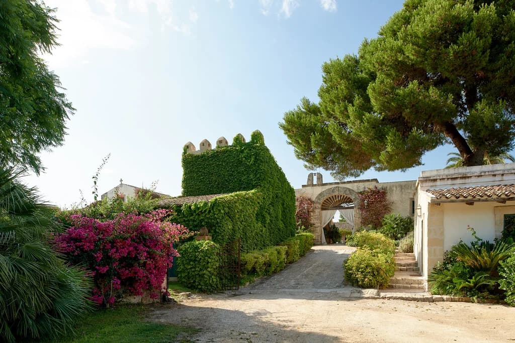 La Dimora del Santo entrance gatehouse with bougainvillea, Brucoli, Sicily, Italy