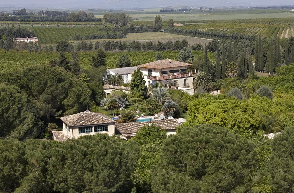 Tenuta di San Giorgio aerial estate view over vineyards and gardens, Scordia, Sicily, Italy