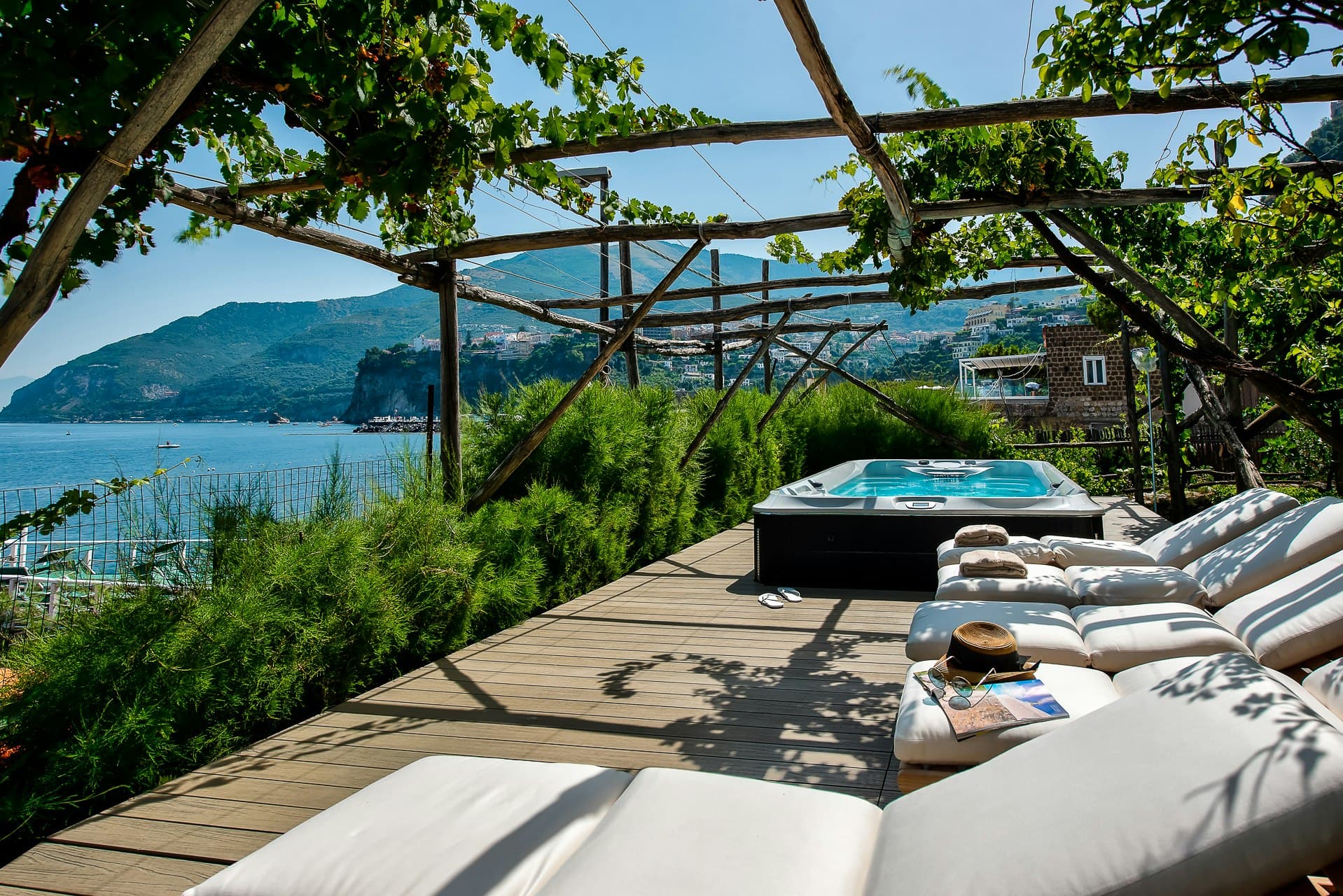 Mount of Love terrace with hot tub and pergola overlooking Bay of Naples, Vico Equense, Amalfi Coast, Italy