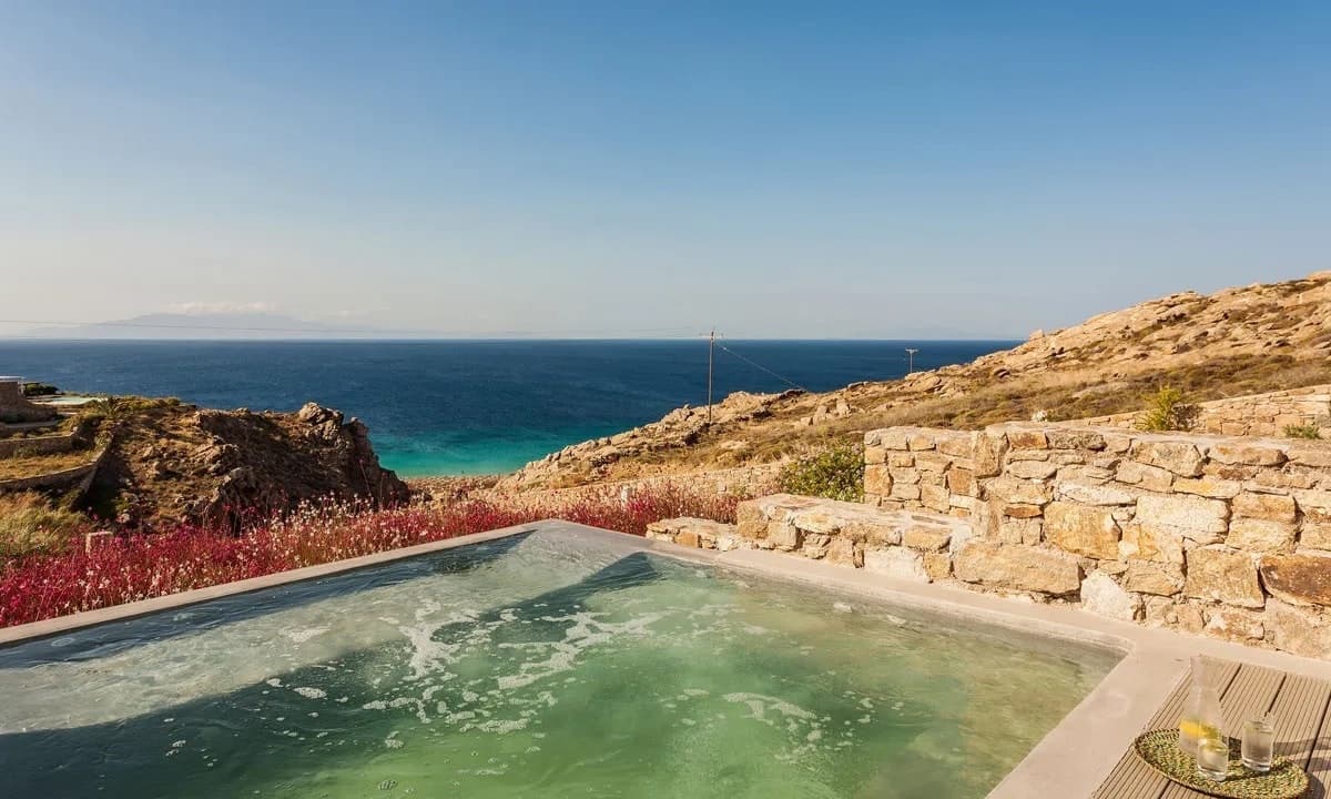 Ancient Azure Vistas infinity pool with Aegean Sea views, Mykonos, Cyclades Islands, Greece