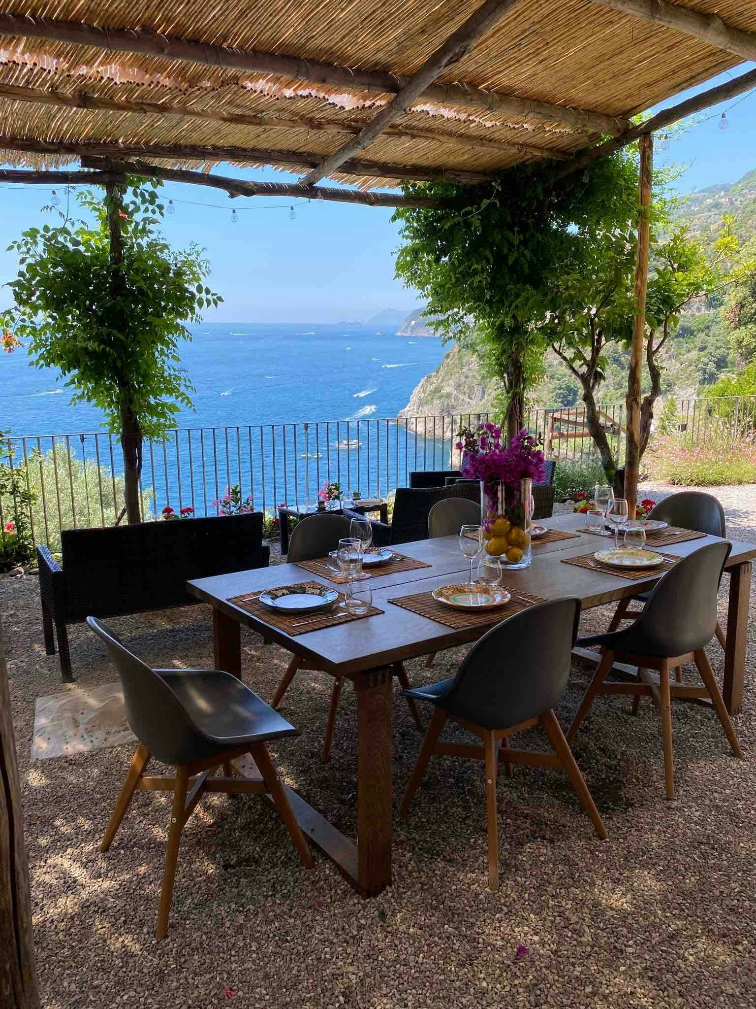 The Magic of Amalfi outdoor dining terrace with coastal views, Conca dei Marini, Amalfi Coast, Italy