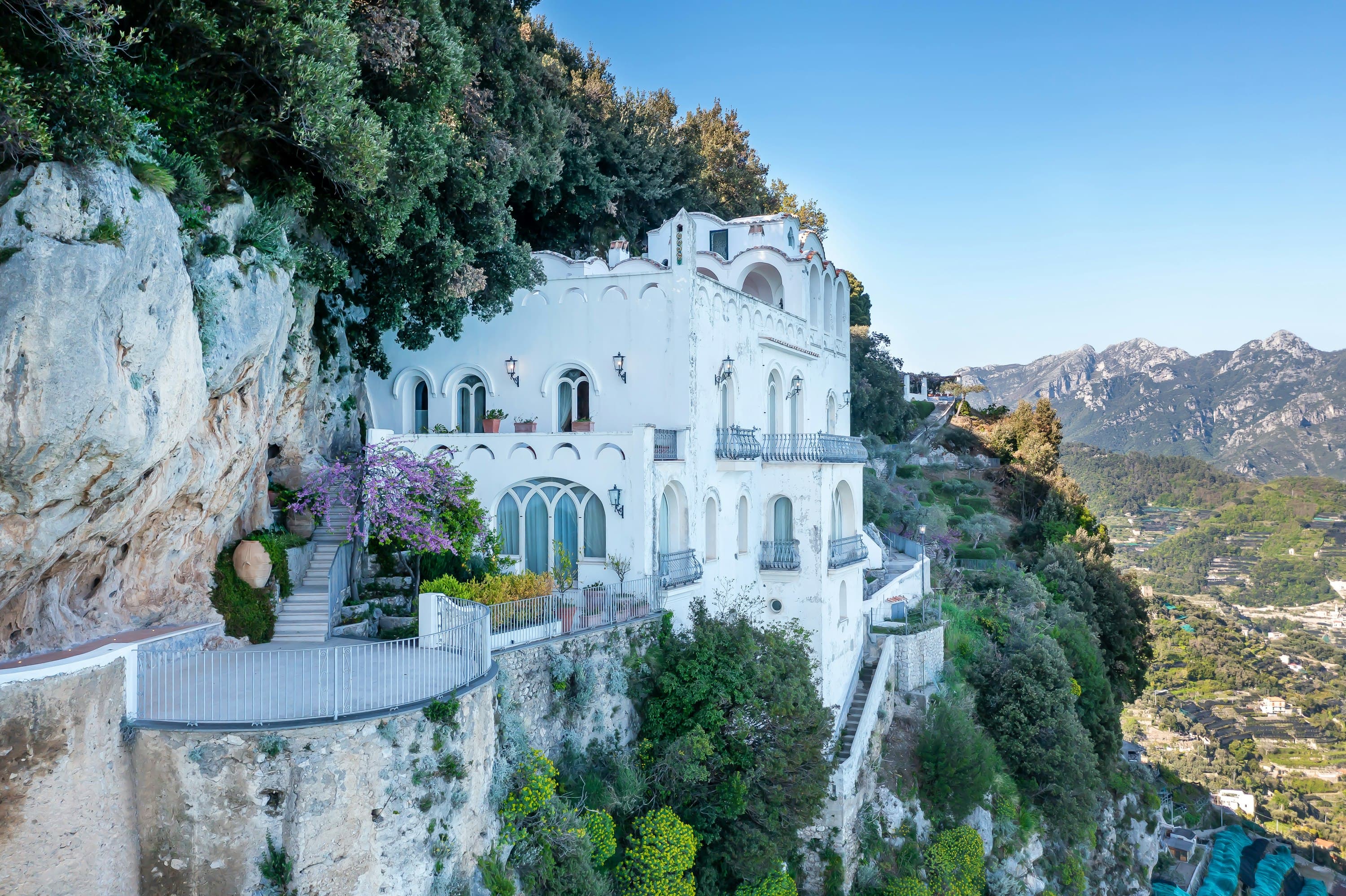 The Enchanting Terrace villa exterior cascading down cliffside terraces, Salerno, Amalfi Coast, Italy