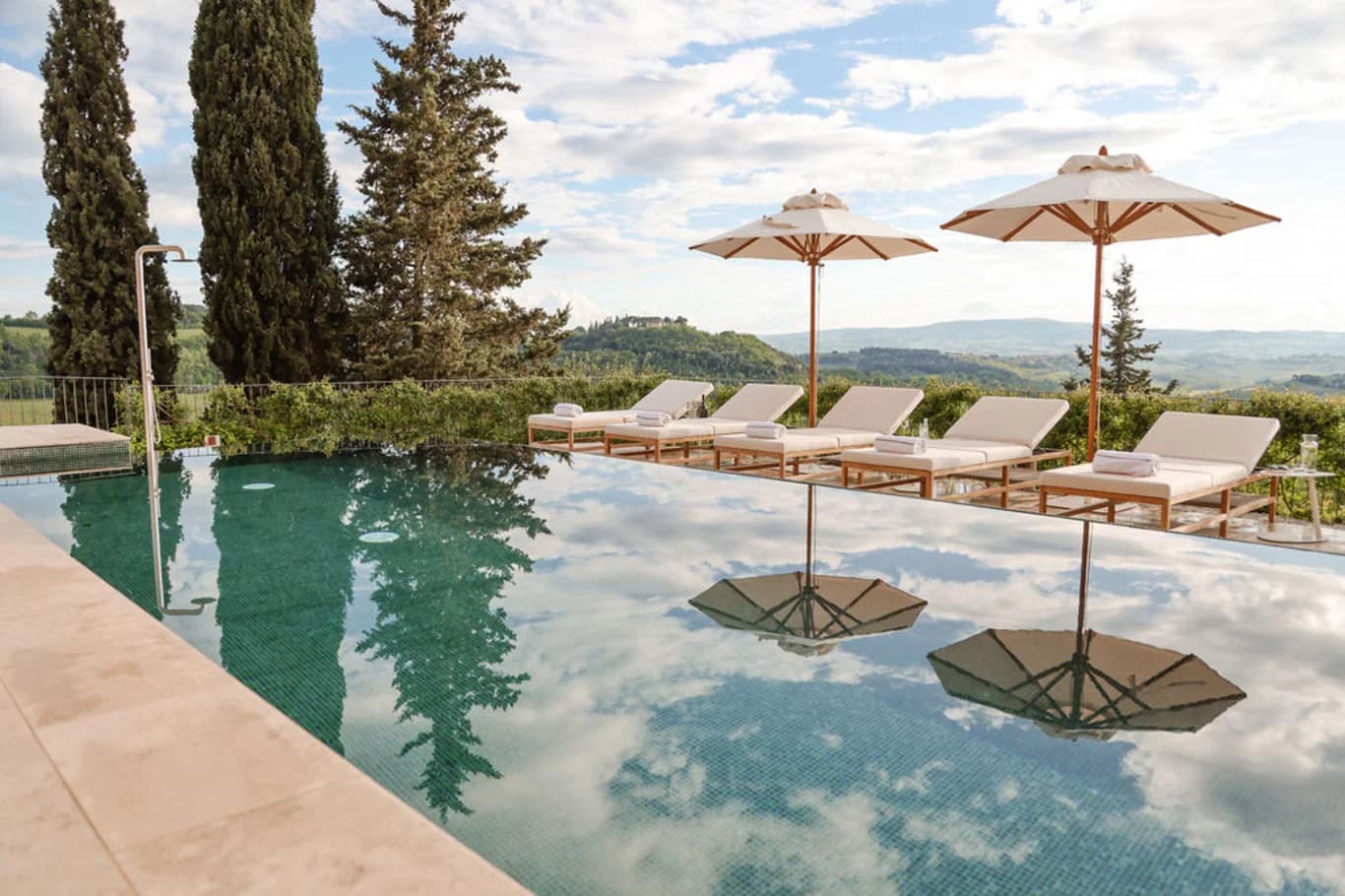 Il Santuario infinity pool with teal mosaic tiles and countryside views, Barberino Tavarnelle, Italy