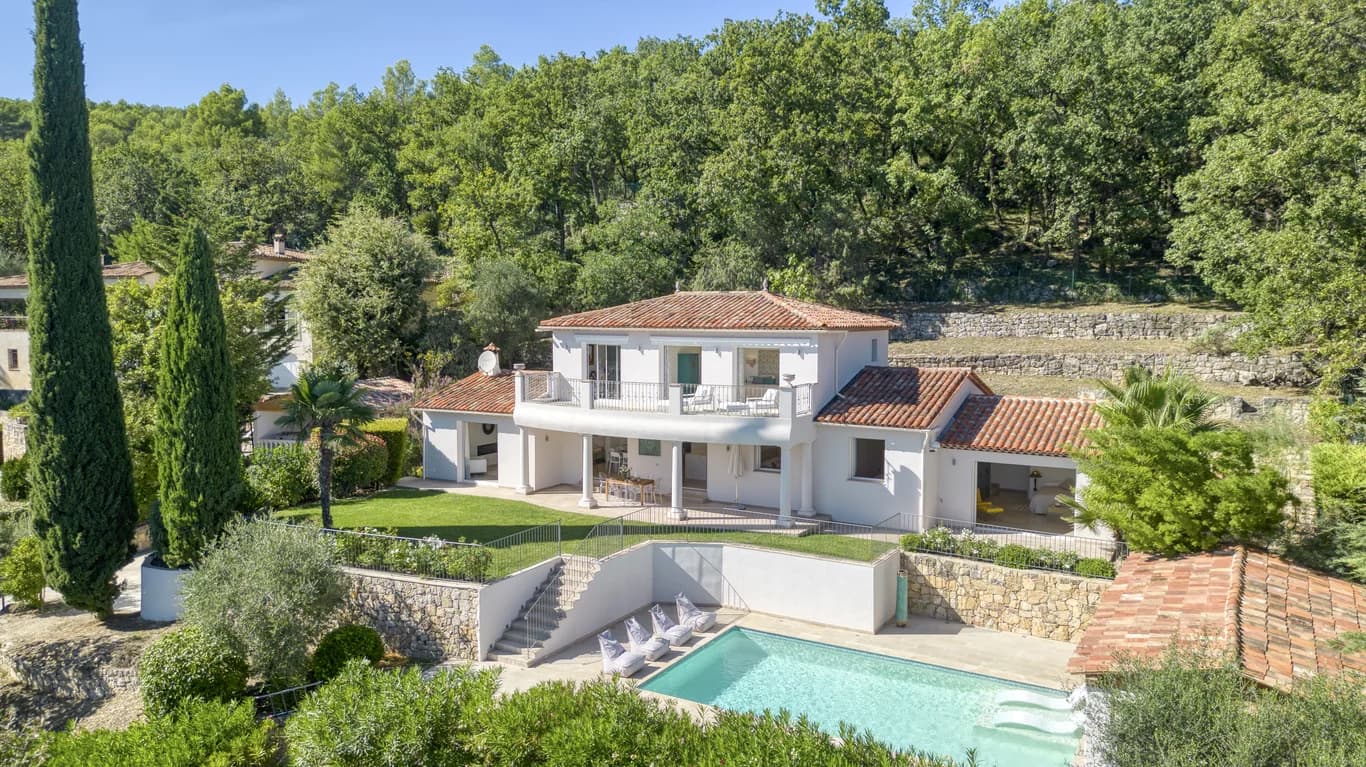 Villa Enchantée aerial exterior with pool and cypress-lined terraces, Le Rouret, France