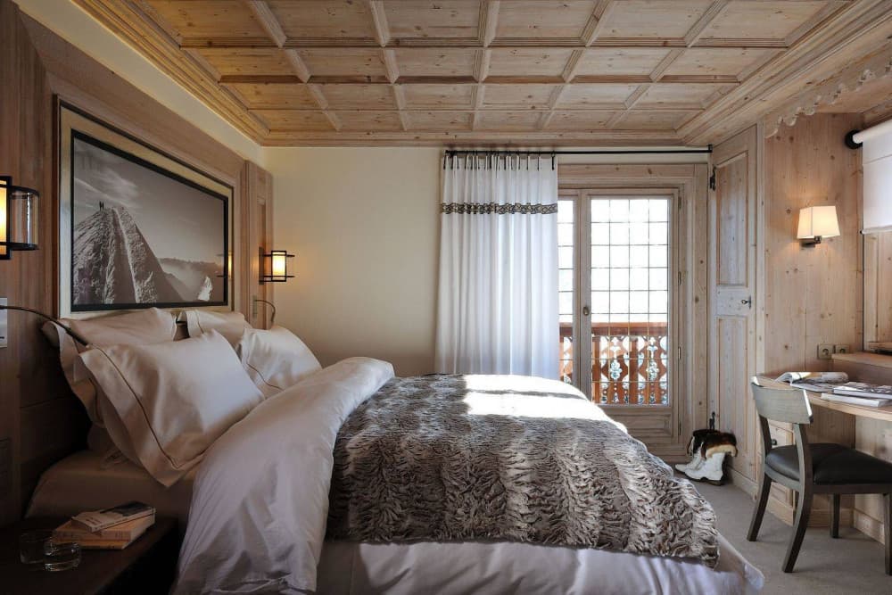 Courchevel 37 master bedroom with pine ceiling and mountain balcony, Courchevel 1850, France