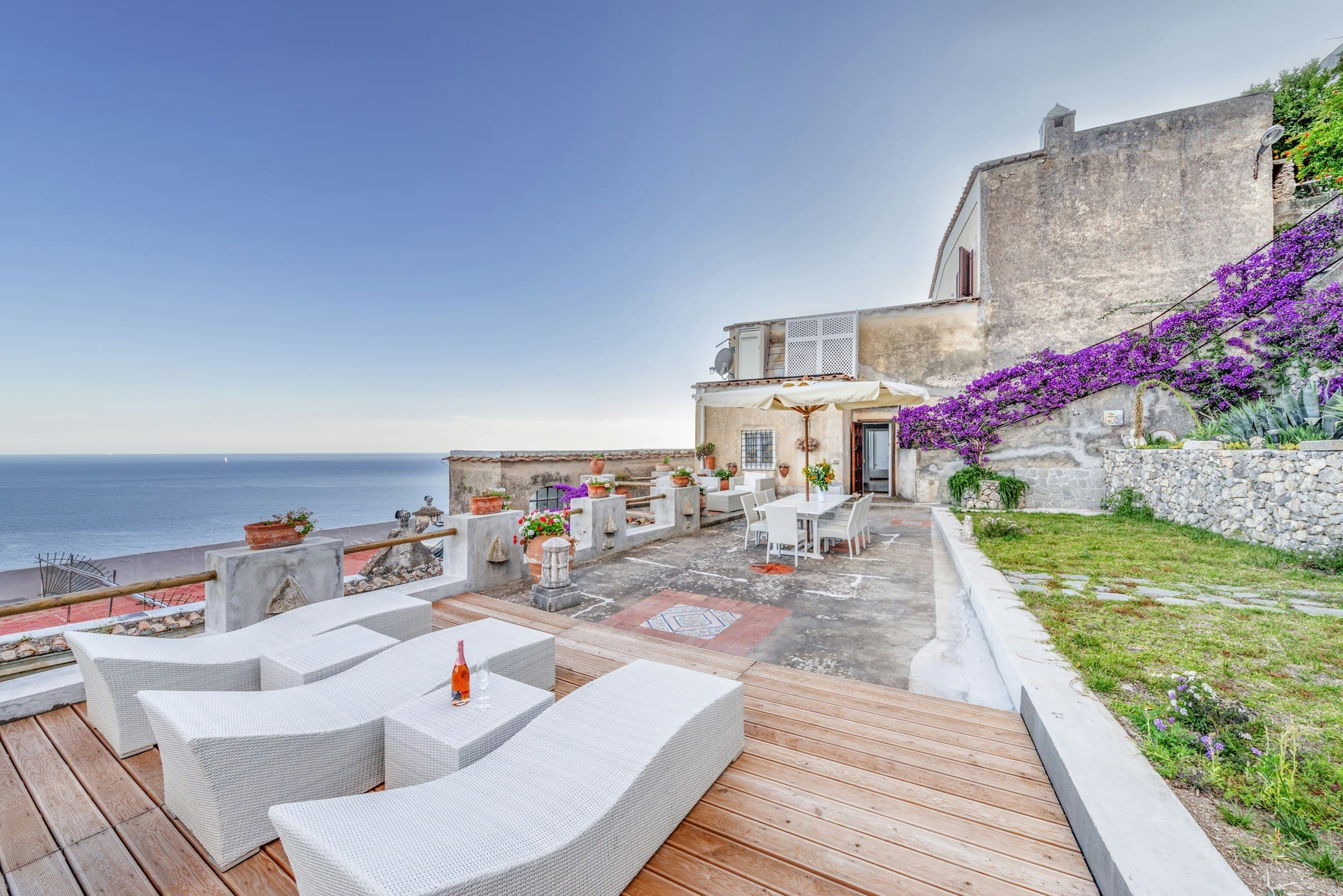 Arch Above the Sea terrace with Mediterranean views and bougainvillea, Praiano, Amalfi Coast, Italy