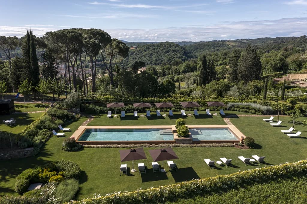 Dimora Fiorentina outdoor lap pool with Tuscan hills panorama, Florence, Italy