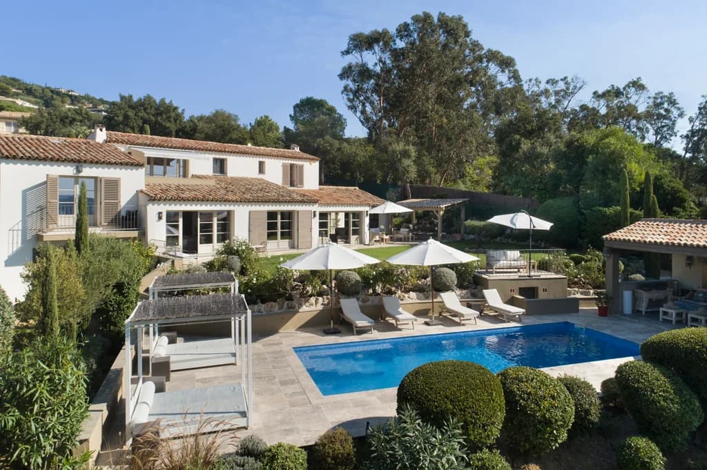 Villa Paradis rear exterior with pool, pergola and pool house at golden hour, Sainte-Maxime, France