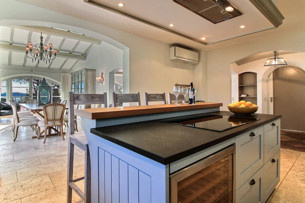 Villa Dreams open-plan kitchen with granite island and wine cooler, Sainte-Maxime, France