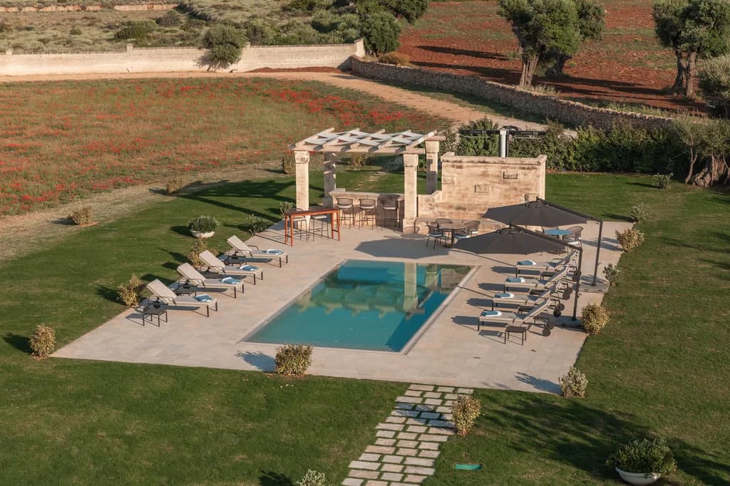 La Piccola Torre aerial pool view with stone pergola and olive groves, Savelletri, Puglia, Italy