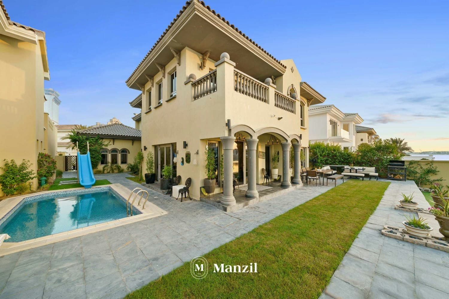 A Place in the Palms villa exterior with private pool and arched loggia, Palm Jumeirah, Dubai