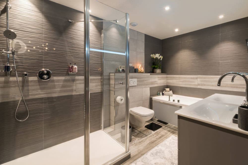 Courchevel 38 en-suite bathroom with rainfall shower and soaking bath, Courchevel 1850, France