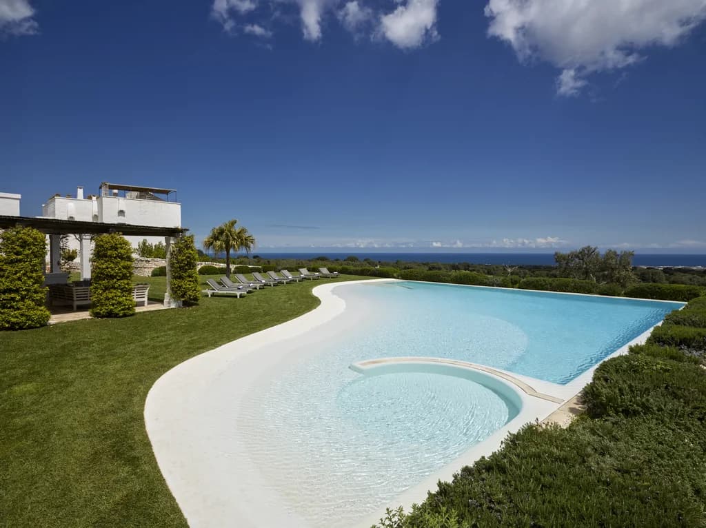 Masseria Monopoli infinity pool with limestone surround and Adriatic Sea views, Monopoli, Puglia, Italy