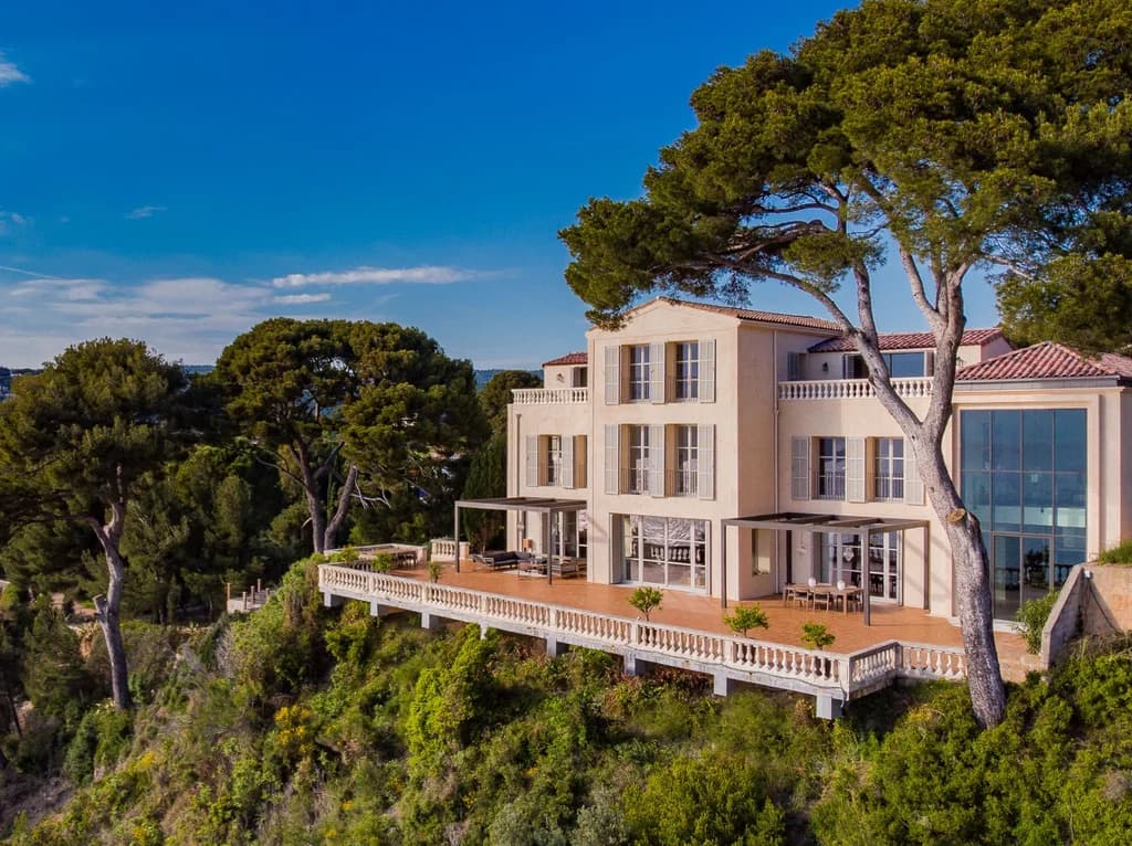 Villa Cassis cliffside exterior facade with wraparound terrace and glass extension, Cassis, France