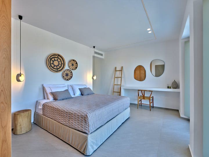 Paros Bliss master bedroom with woven wall art, Paros, Cyclades Islands, Greece