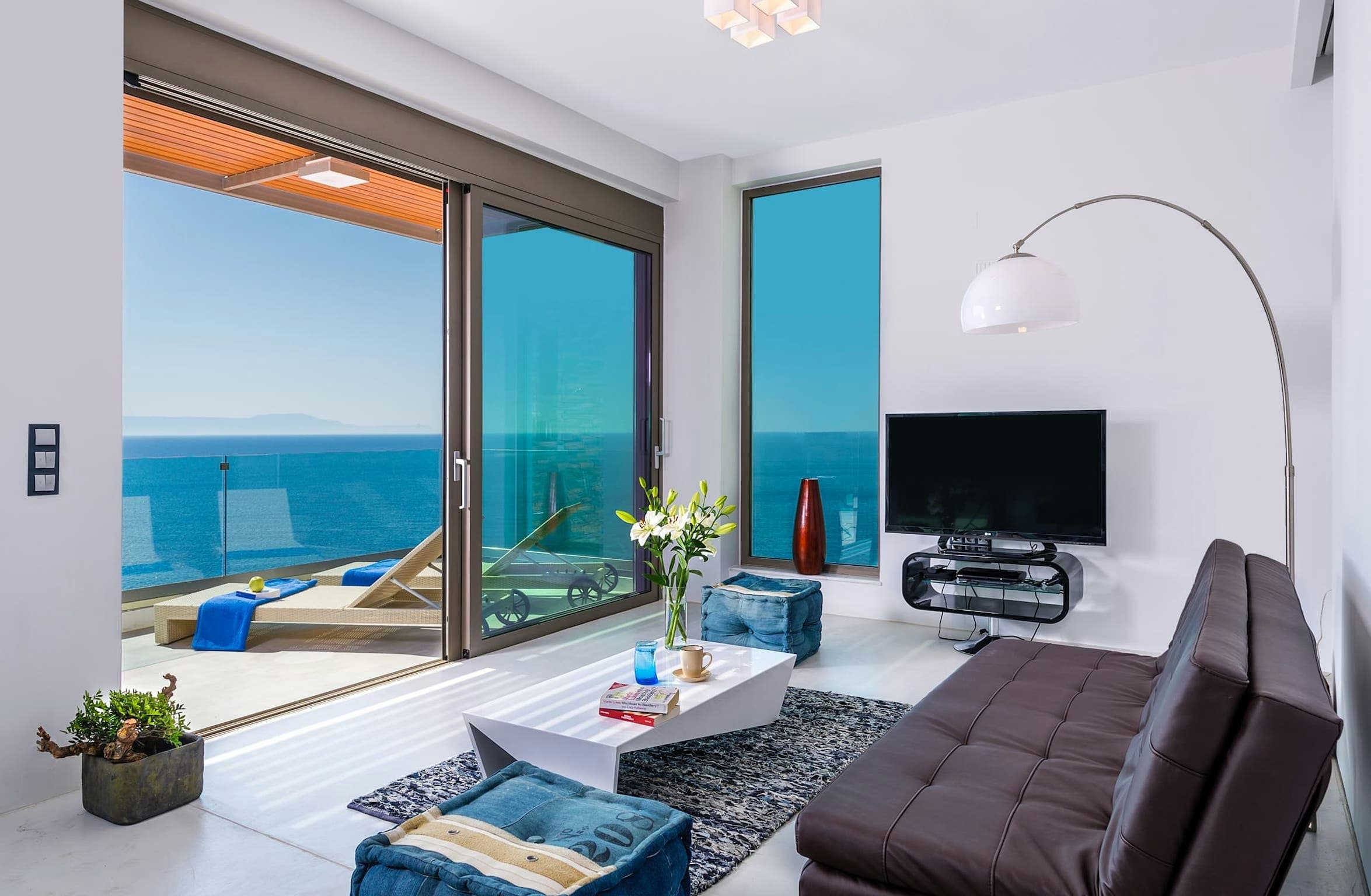 On The Water's Edge modern living room with sea views, Santorini, Cyclades Islands, Greece