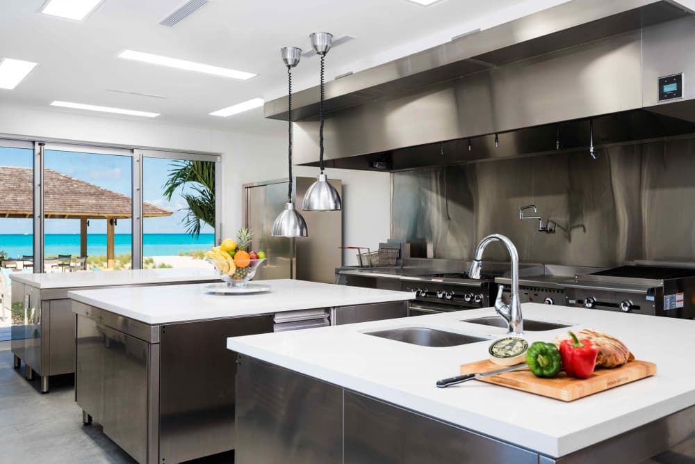 Sentosa villa chef's kitchen with dual islands and sea views, Grace Bay, Turks and Caicos Islands