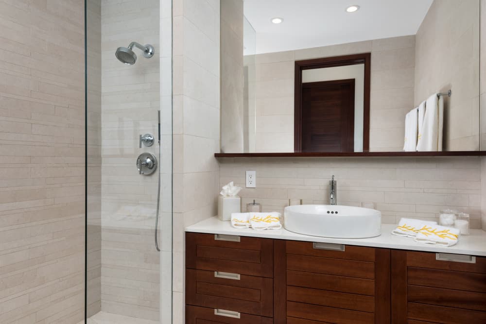 Sentosa villa outdoor soaking tub within limestone walls, Grace Bay, Turks and Caicos Islands