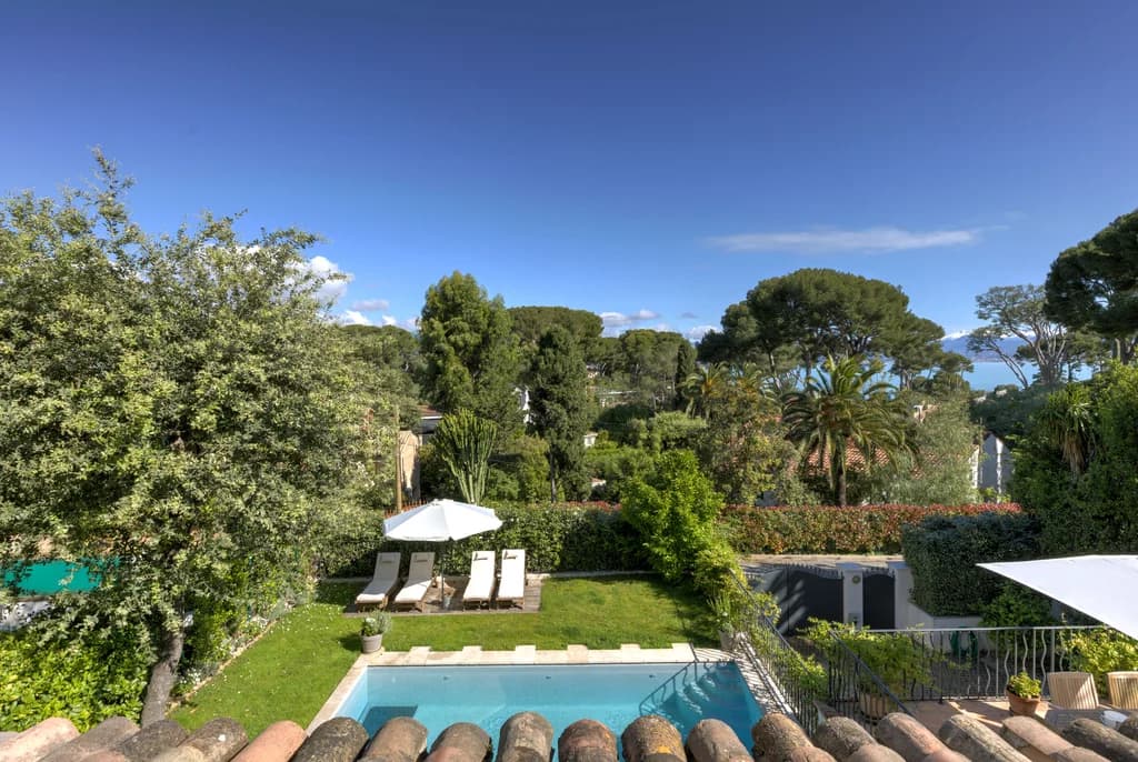 Villa Cuvier aerial garden view with pool and sea glimpse, Cap d'Antibes, France