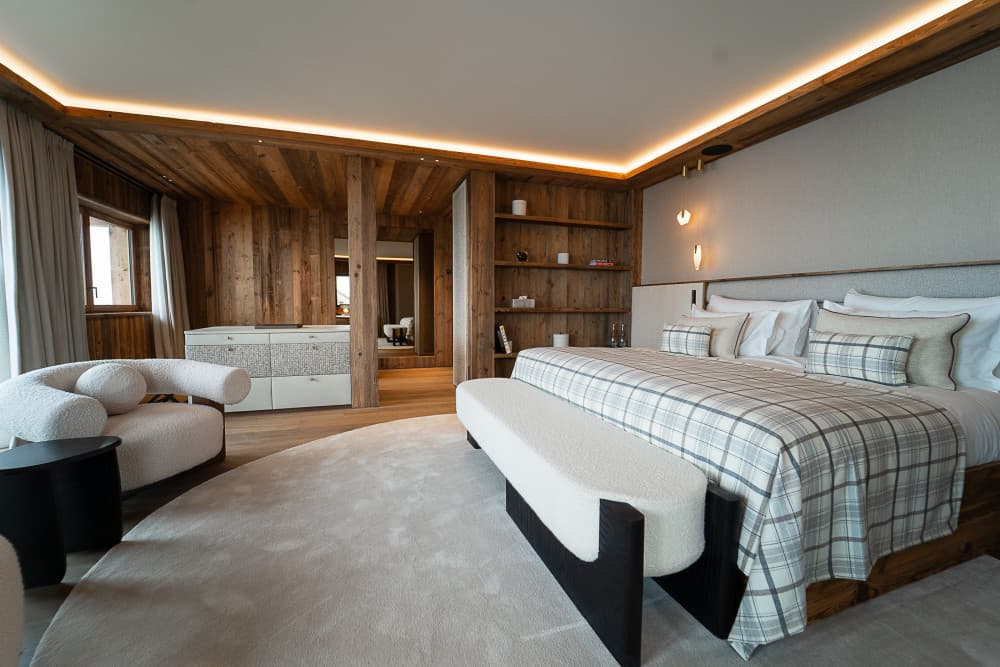 Courchevel 208 master bedroom with reclaimed timber walls, Courchevel 1850, French Alps, France