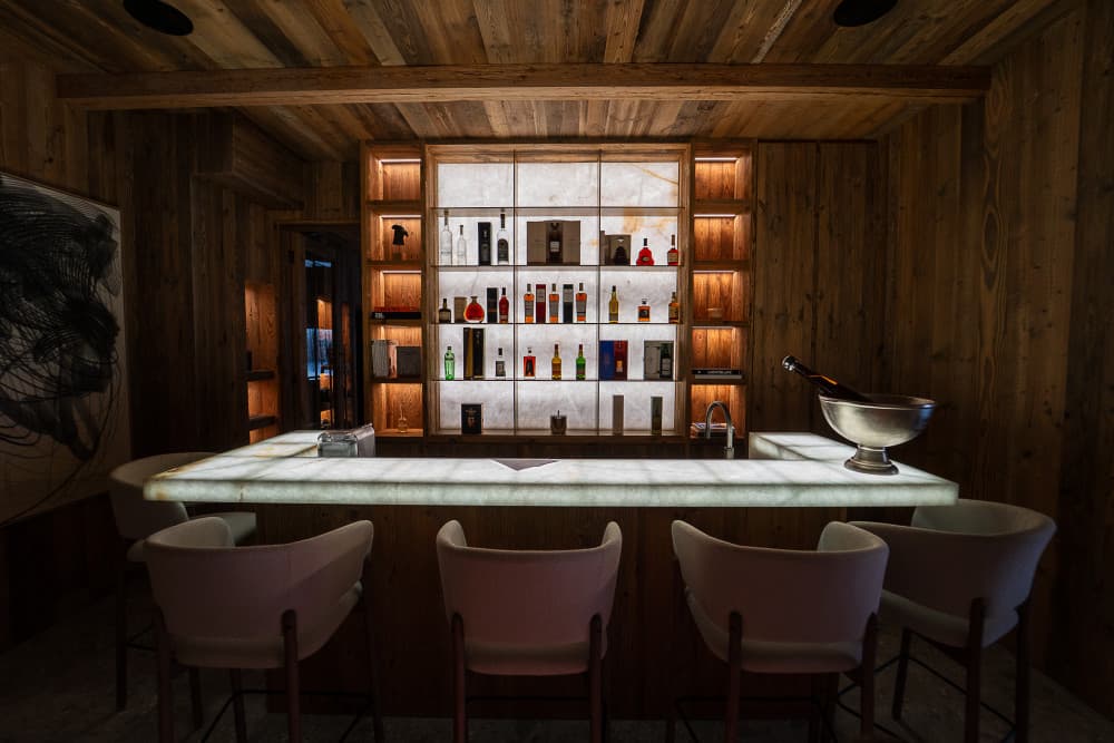 Courchevel 208 private bar with backlit marble and onyx counter, Courchevel 1850, France