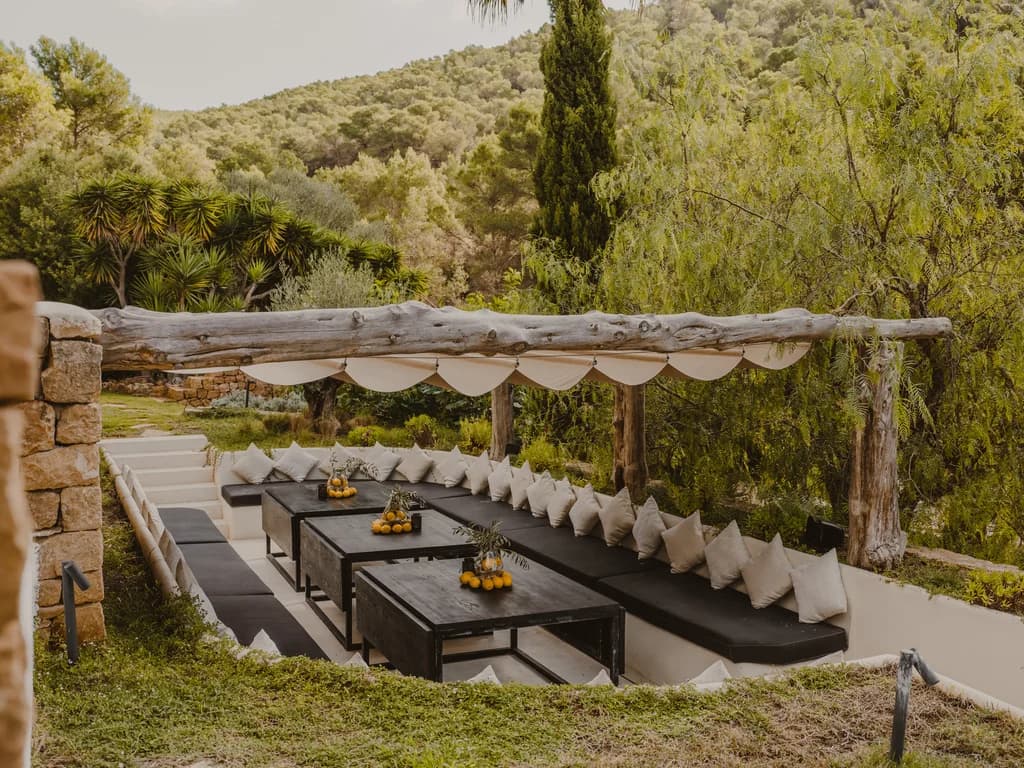 Finca Tranquila sunken garden lounge with driftwood pergola, Ibiza, Spain