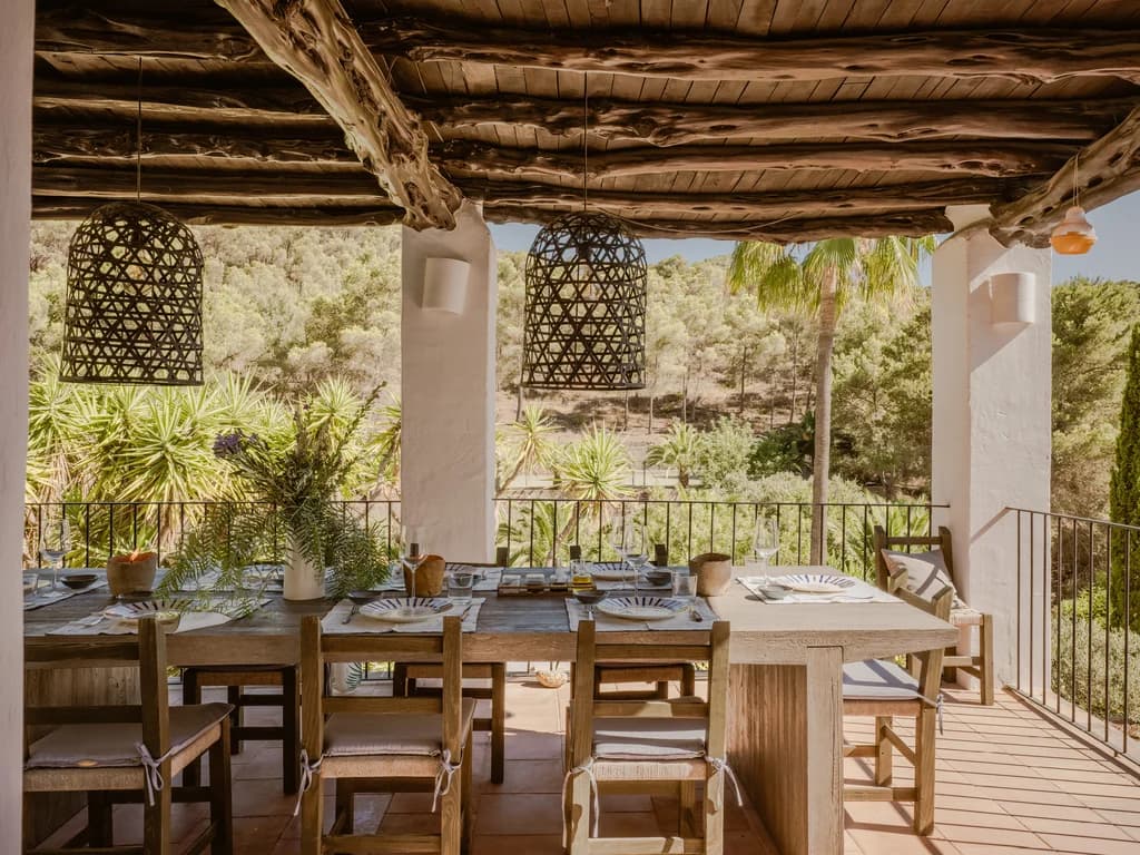 Finca Tranquila covered terrace dining area with sabina log ceiling, Ibiza, Spain