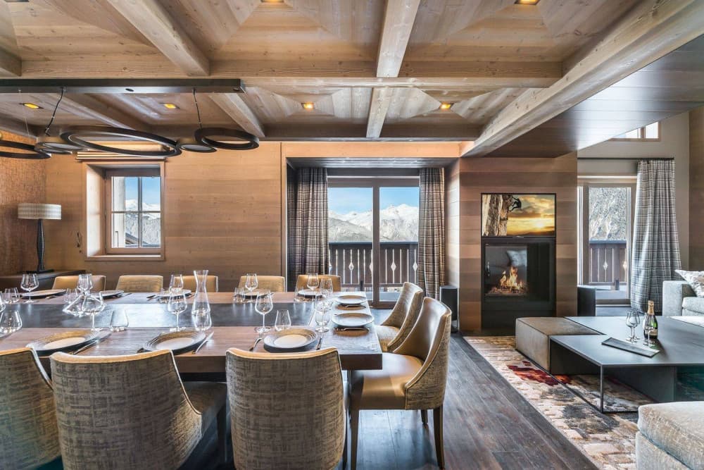 Courchevel 7 formal dining room with stone fireplace and mountain views, Courchevel 1850, France