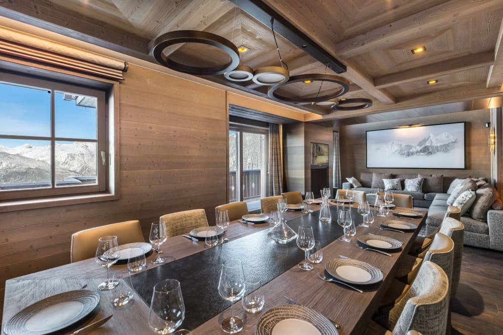 Courchevel 7 large group dining room with ring chandelier and crystal settings, Courchevel 1850, France