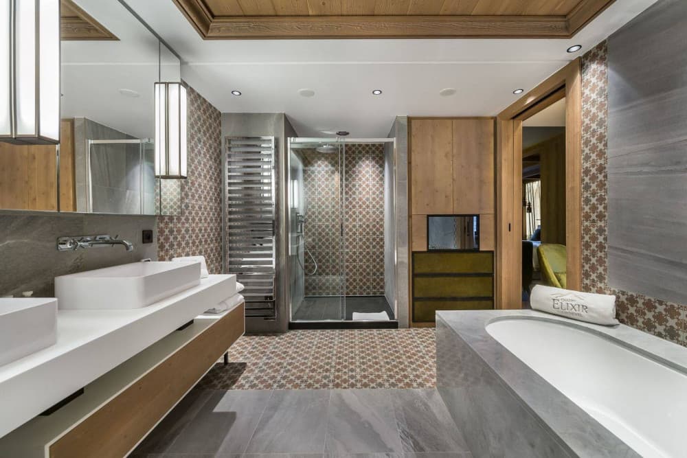 Courchevel 7 master ensuite with freestanding tub and mosaic feature wall, Courchevel 1850, France