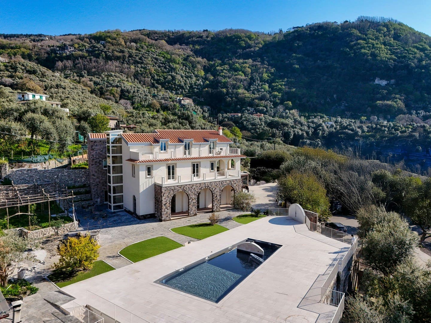 Casarlano Sunsets villa aerial view with pool and terraced gardens, Sorrento, Amalfi Coast, Italy