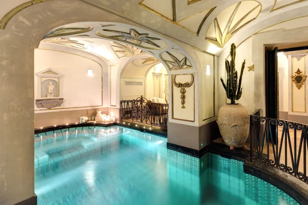 Palazzo Barocco indoor pool with frescoed baroque vaulted arches, Positano, Italy