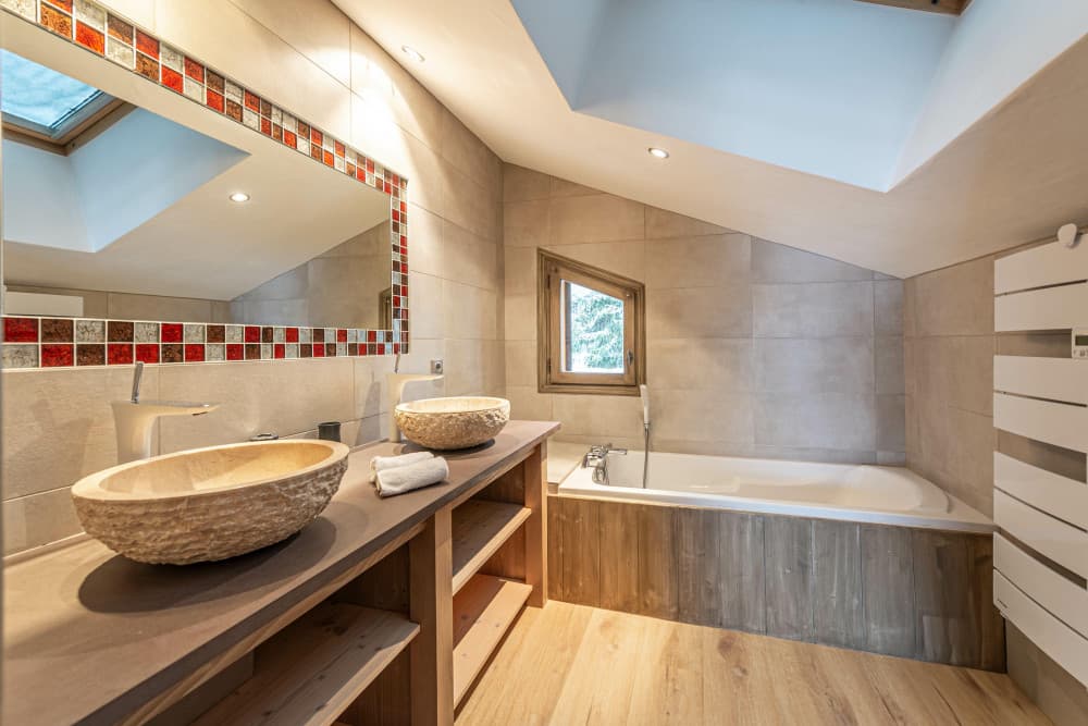 Courchevel 168 master bathroom corner tub with alpine ski mural, Courchevel 1850, France