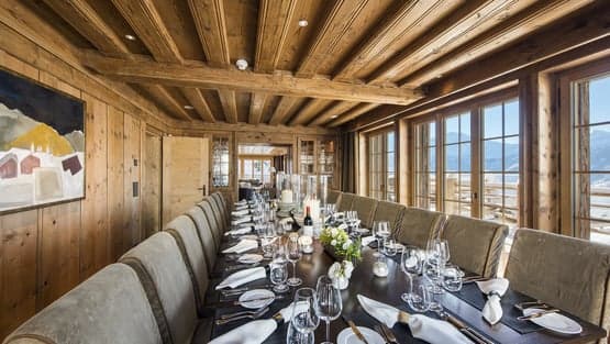 Chalet On the Top master bedroom with vaulted beams and Alpine balcony, Verbier, Switzerland