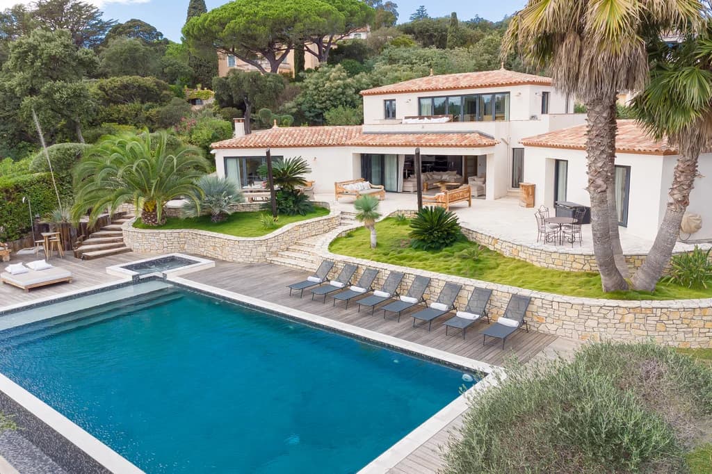 Villa Riviera aerial overview of estate with pool, terraces and gardens, Bay of St. Tropez, France