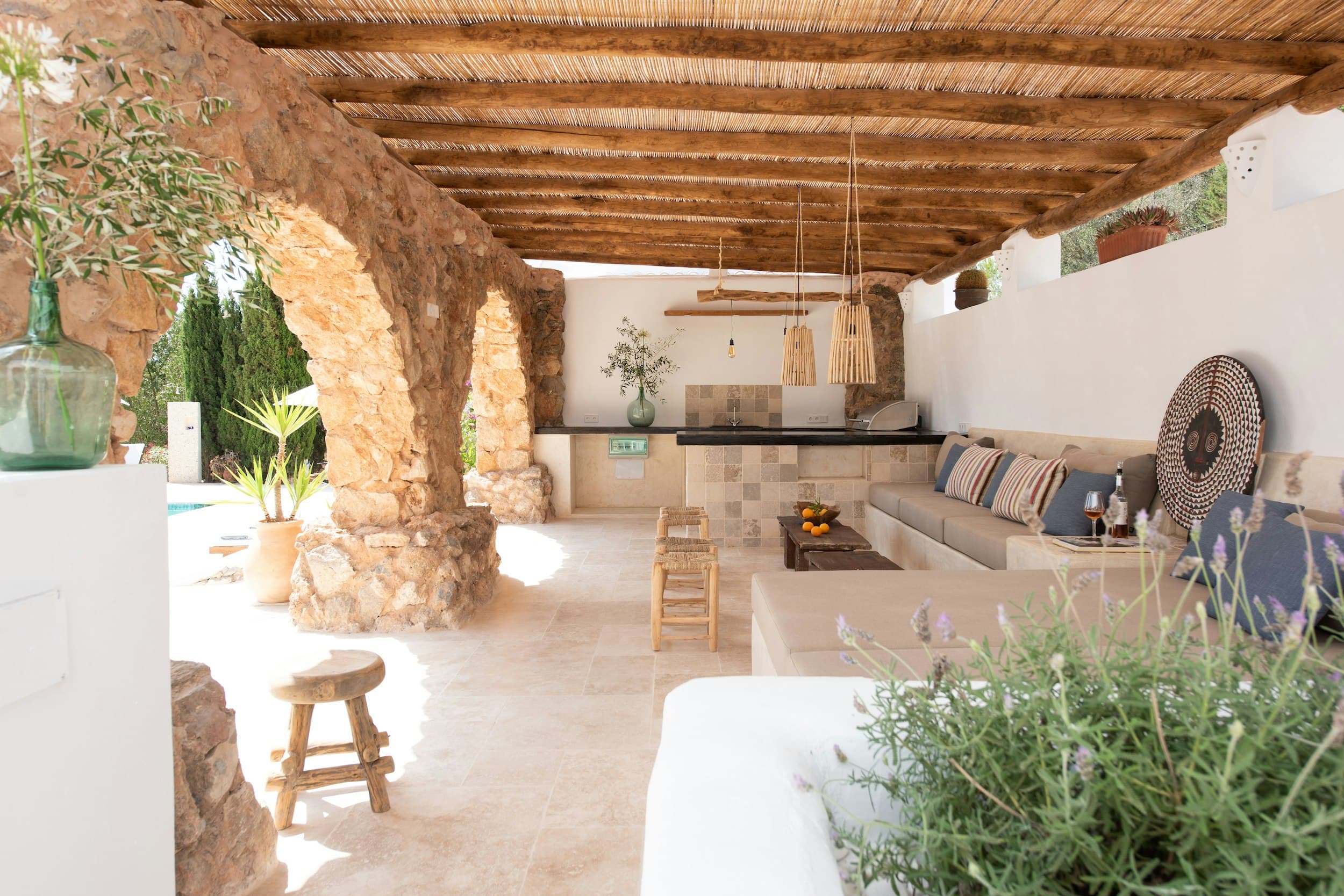 Shimmering Sunlight covered terrace with outdoor kitchen, Santa Eulària des Riu, Balearic Islands, Spain